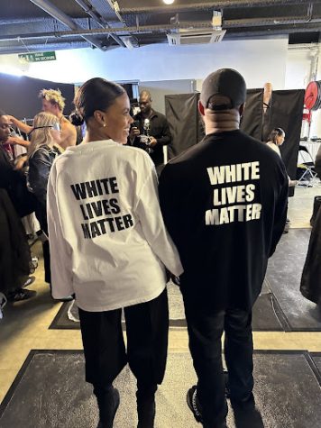 Kanye West and Candace Owens wearing “White Lives Matter” shirts at his fashion show in Paris.